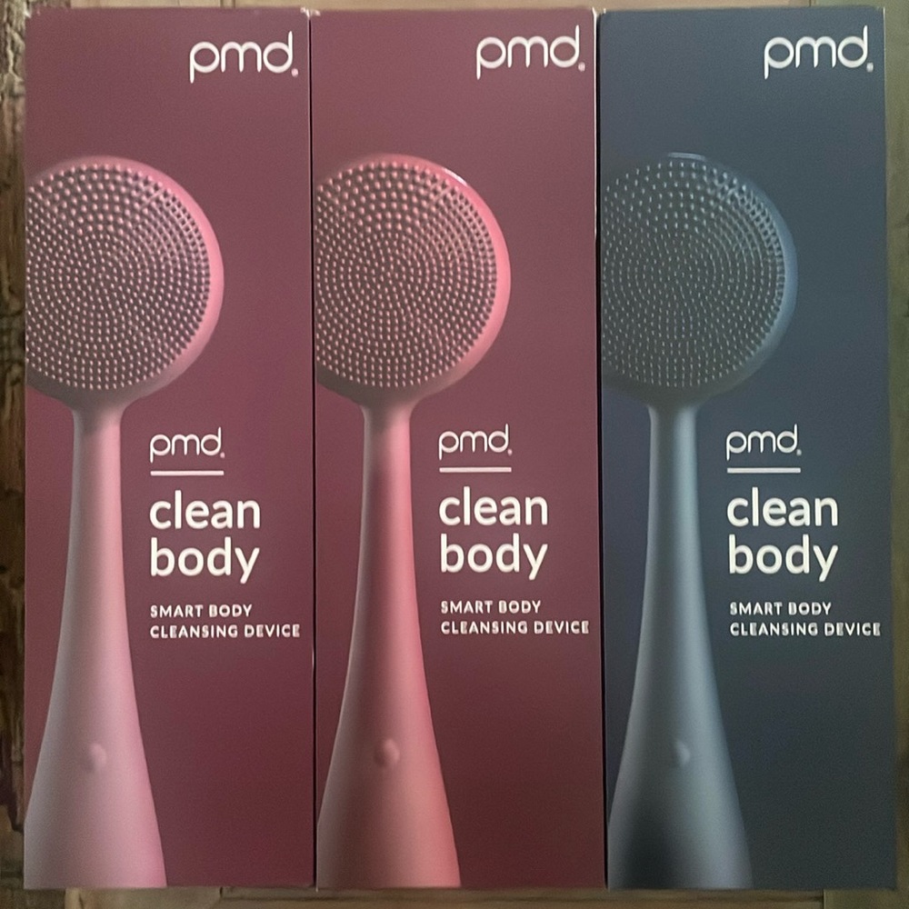 pmd— clean body— smart body cleansing device  New— remains sealed, unopened.